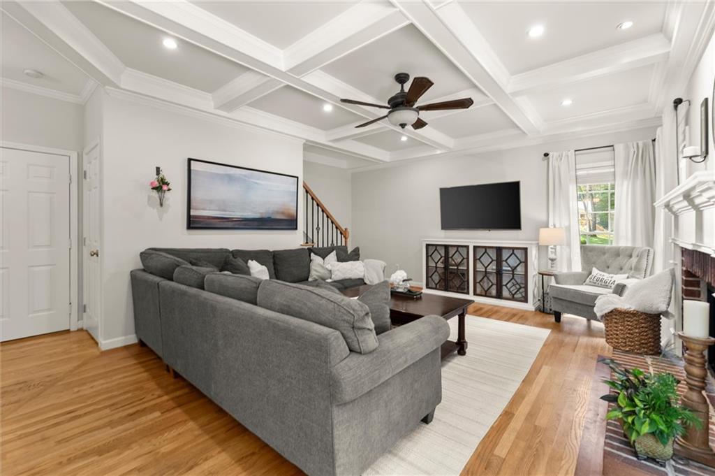 313 Thorntree Lane Canton, GA 30115 - Photo 9 of 51 a living room with furniture and a flat screen tv