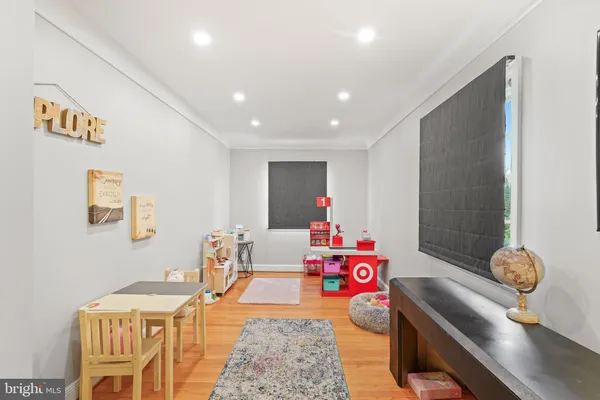 a bedroom with furniture and a table