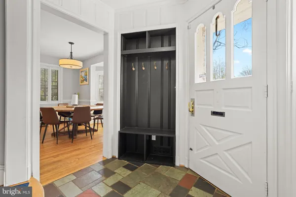 a view of a hallway with seating area