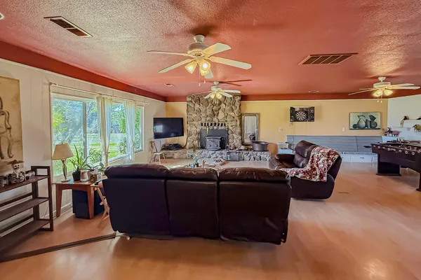 a stove top oven sitting inside of a kitchen