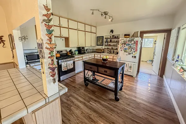 a view of a livingroom with furniture and a window