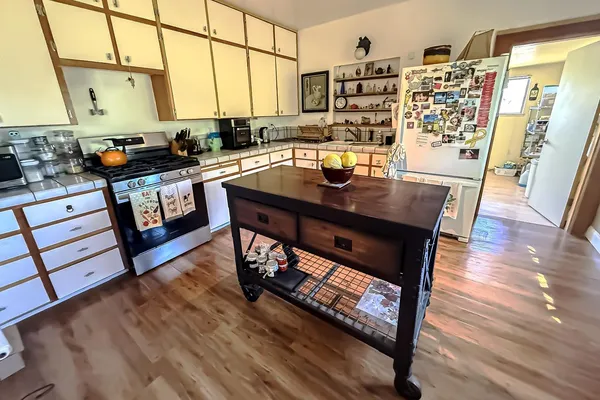a utility room with dryer washer and other items