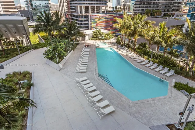a backyard of a house with outdoor seating