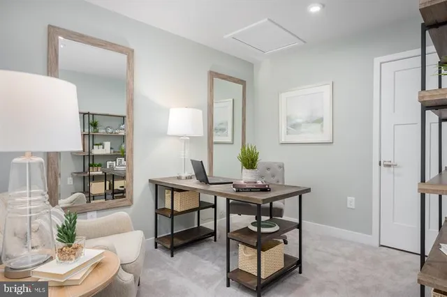 a view of a livingroom with furniture and a couch