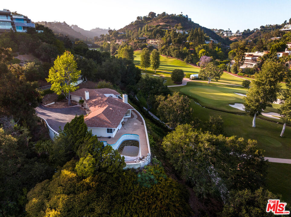 an aerial view of residential house with outdoor space and river