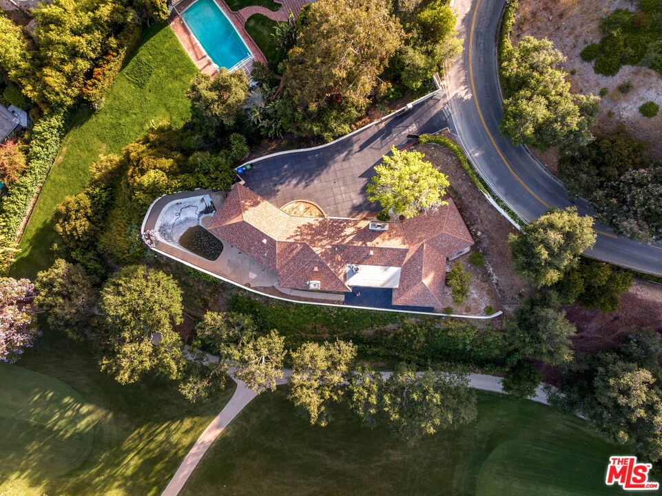 10985 Bellagio Road Los Angeles, CA 90077 - Photo 3 of 5 an aerial view of a house a yard basket ball court and outdoor seating