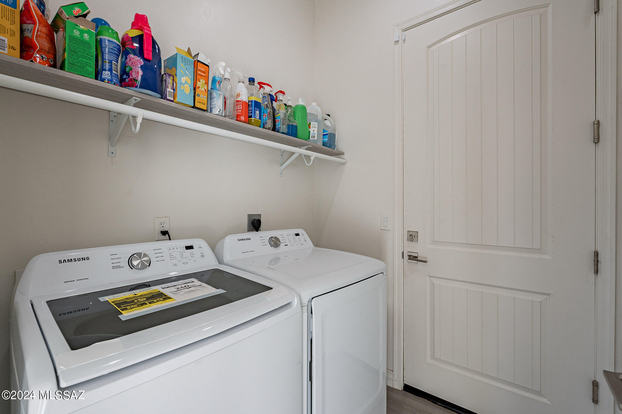 176 Avenida Ostion Rio Rico, AZ 85648 - Photo 38 of 48 a utility room with dryer and washer