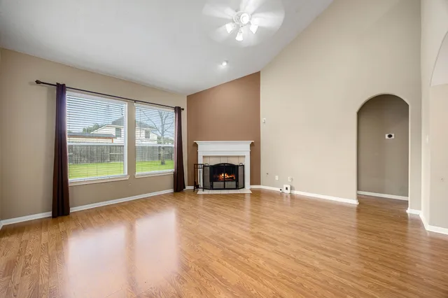 a view of an empty room with a window