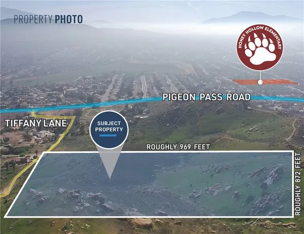 a view of a hall with wooden floor