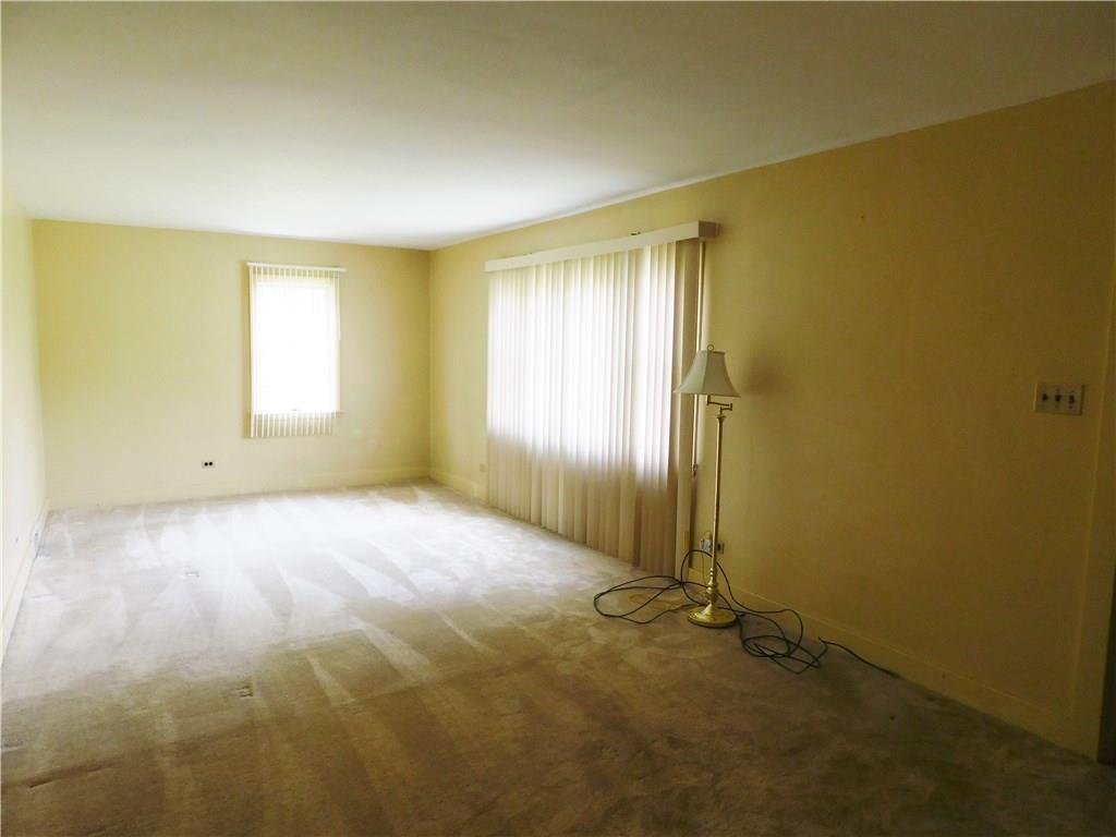 1624 Keystone Park Road New Alexandria, PA 15670 - Photo 2 of 15 The living room is a cheerful place for everyday living.
