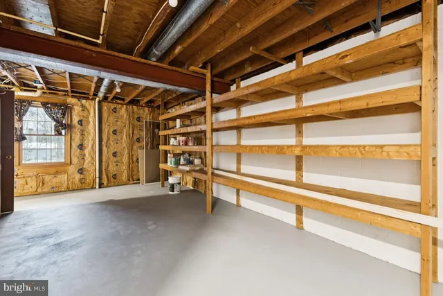 a view of an empty room with a balcony