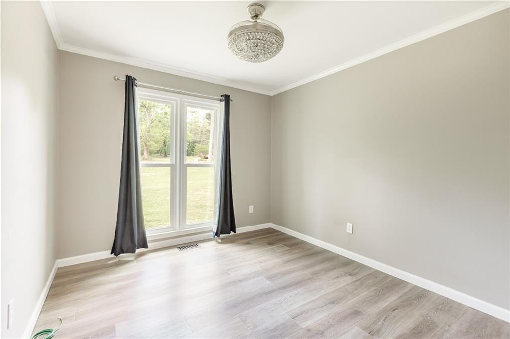 434 Rawley Road Americus, GA 31719 - Photo 41 of 50 an empty room with a window