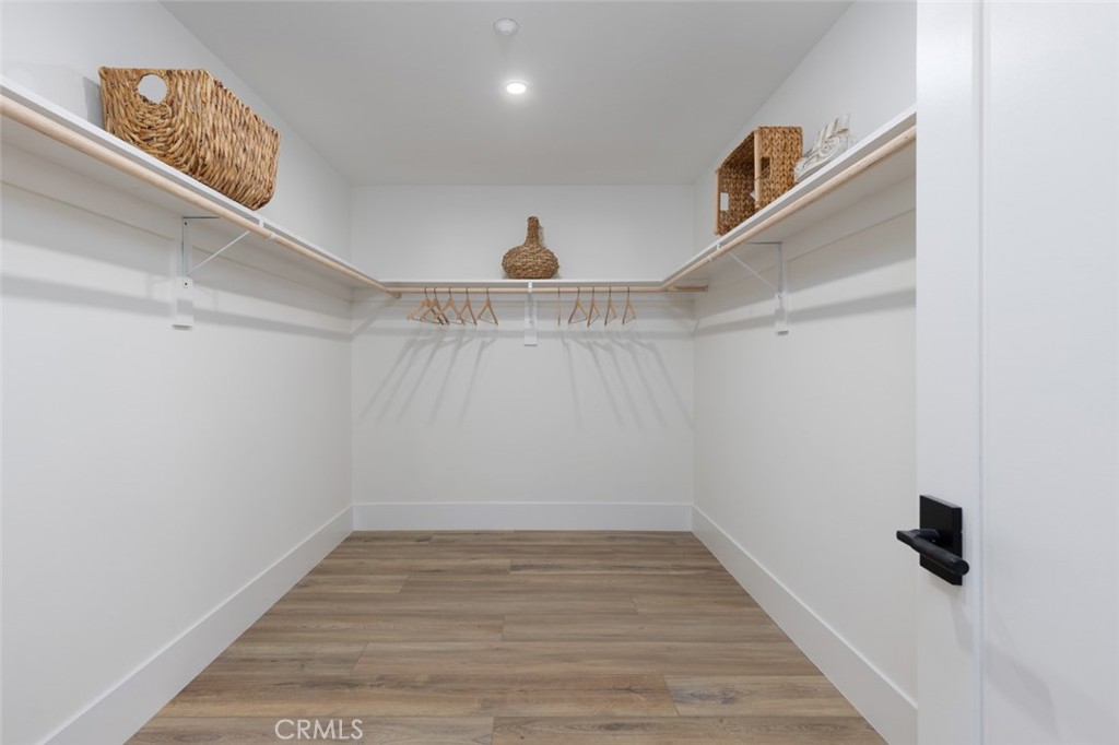 4158 Costero Risco San Clemente, CA 92673 - Photo 19 of 56 a view of a hallway with wooden floor and entryway