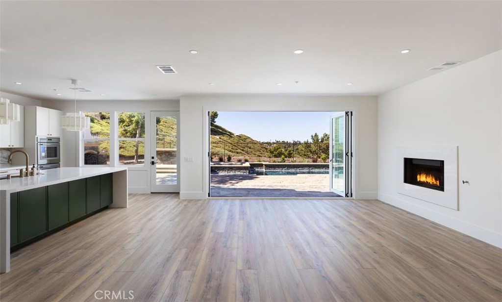 4158 Costero Risco San Clemente, CA 92673 - Photo 22 of 56 a view of an empty room with a window and wooden floor