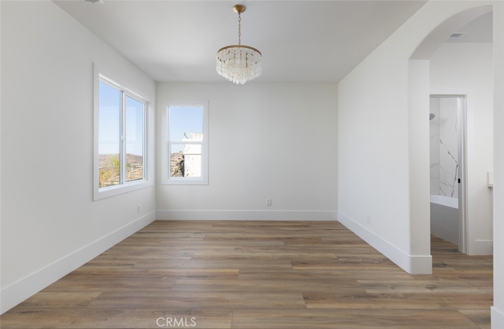 4158 Costero Risco San Clemente, CA 92673 - Photo 36 of 56 a view of an empty room with wooden floor and a window