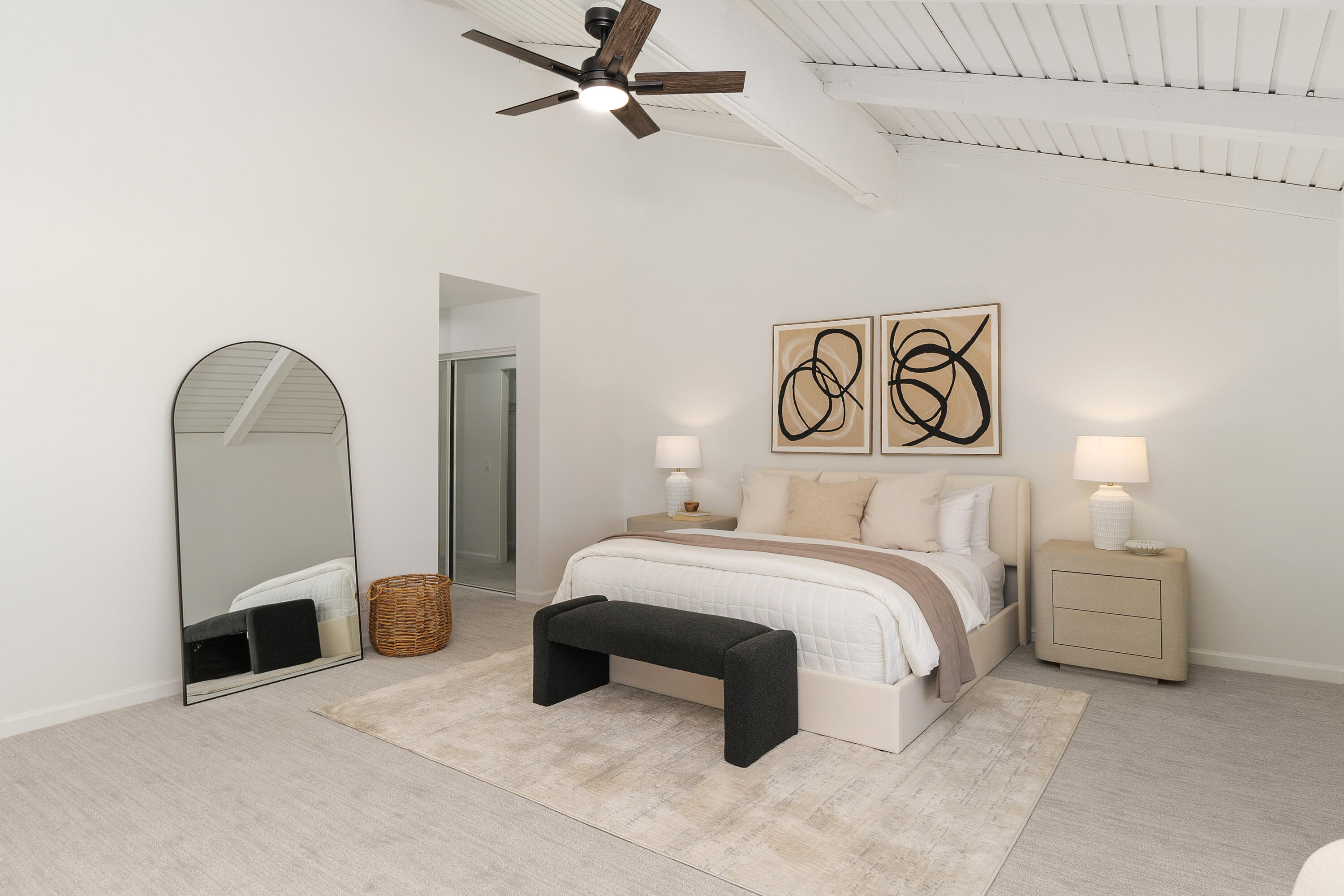 49835 Adelito Circle La Quinta, CA 92253 - Photo 14 of 36 a spacious bedroom with a bed and a table