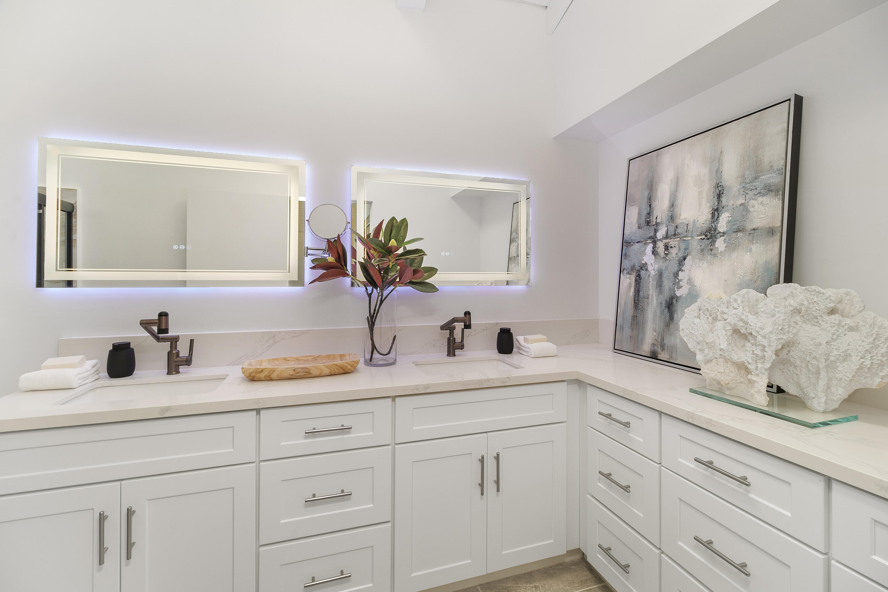 49835 Adelito Circle La Quinta, CA 92253 - Photo 15 of 36 a bathroom with a double vanity sink and a mirror