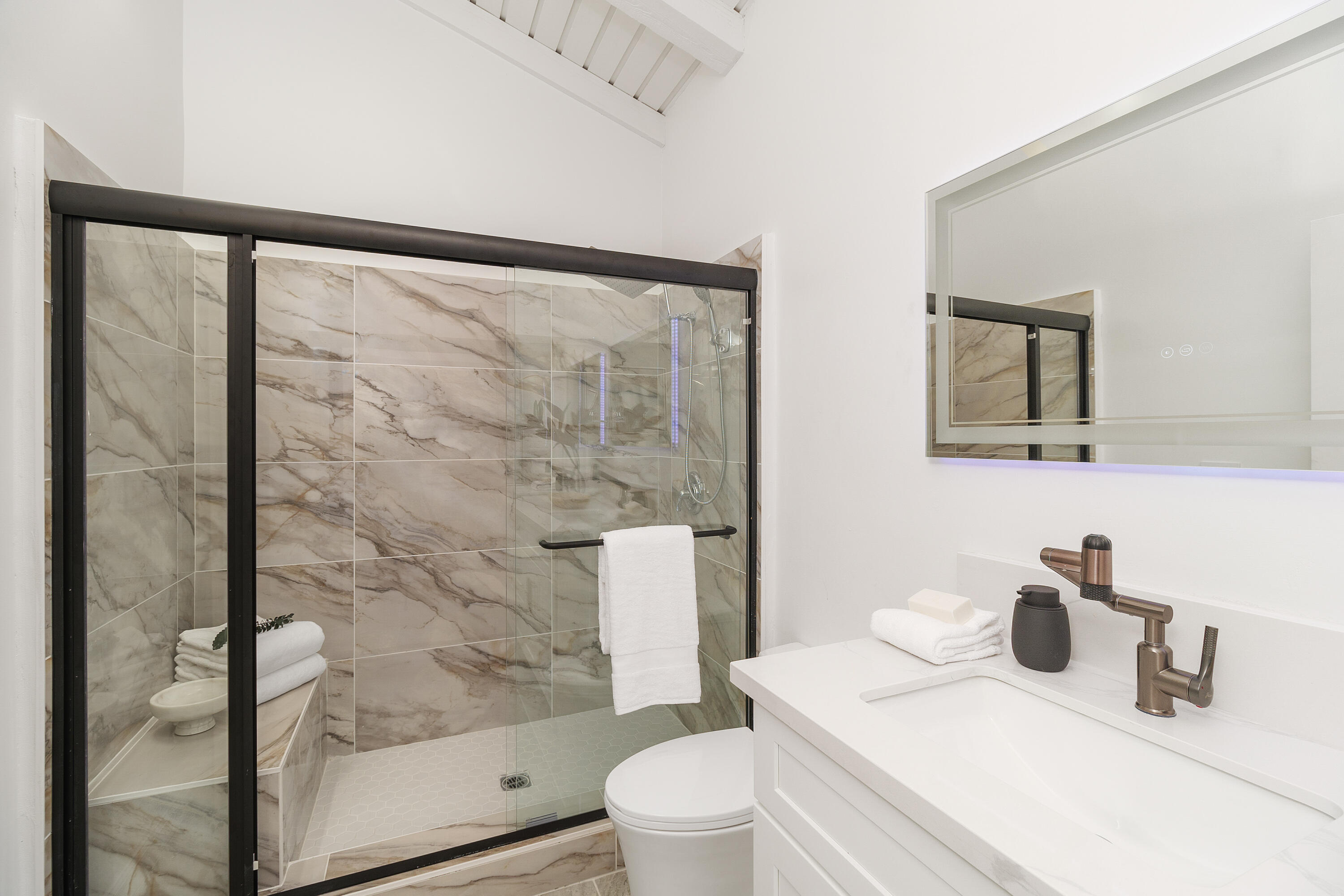 49835 Adelito Circle La Quinta, CA 92253 - Photo 16 of 36 a bathroom with a sink toilet and shower