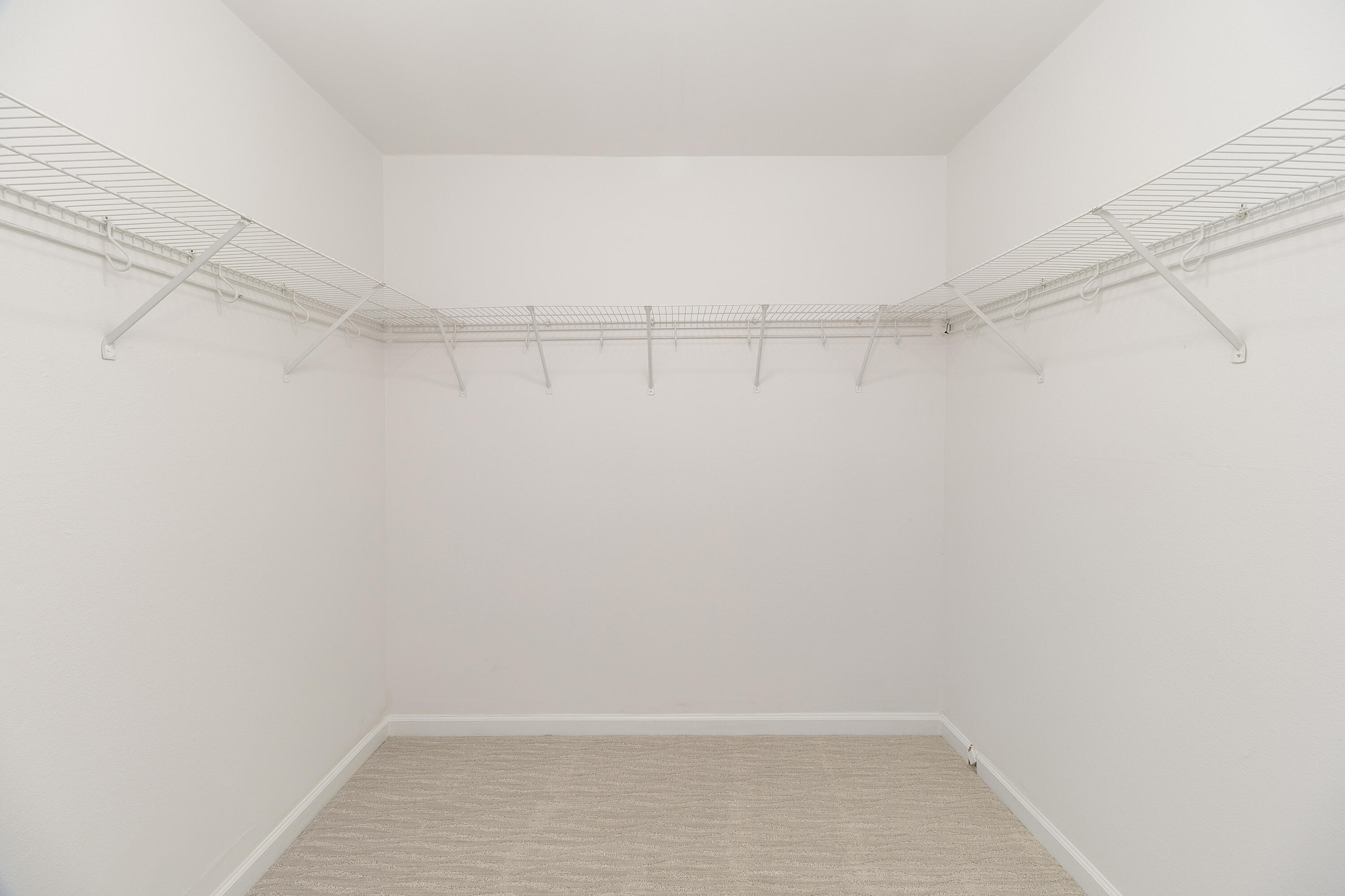 49835 Adelito Circle La Quinta, CA 92253 - Photo 17 of 36 a view of a room with racks on the wall