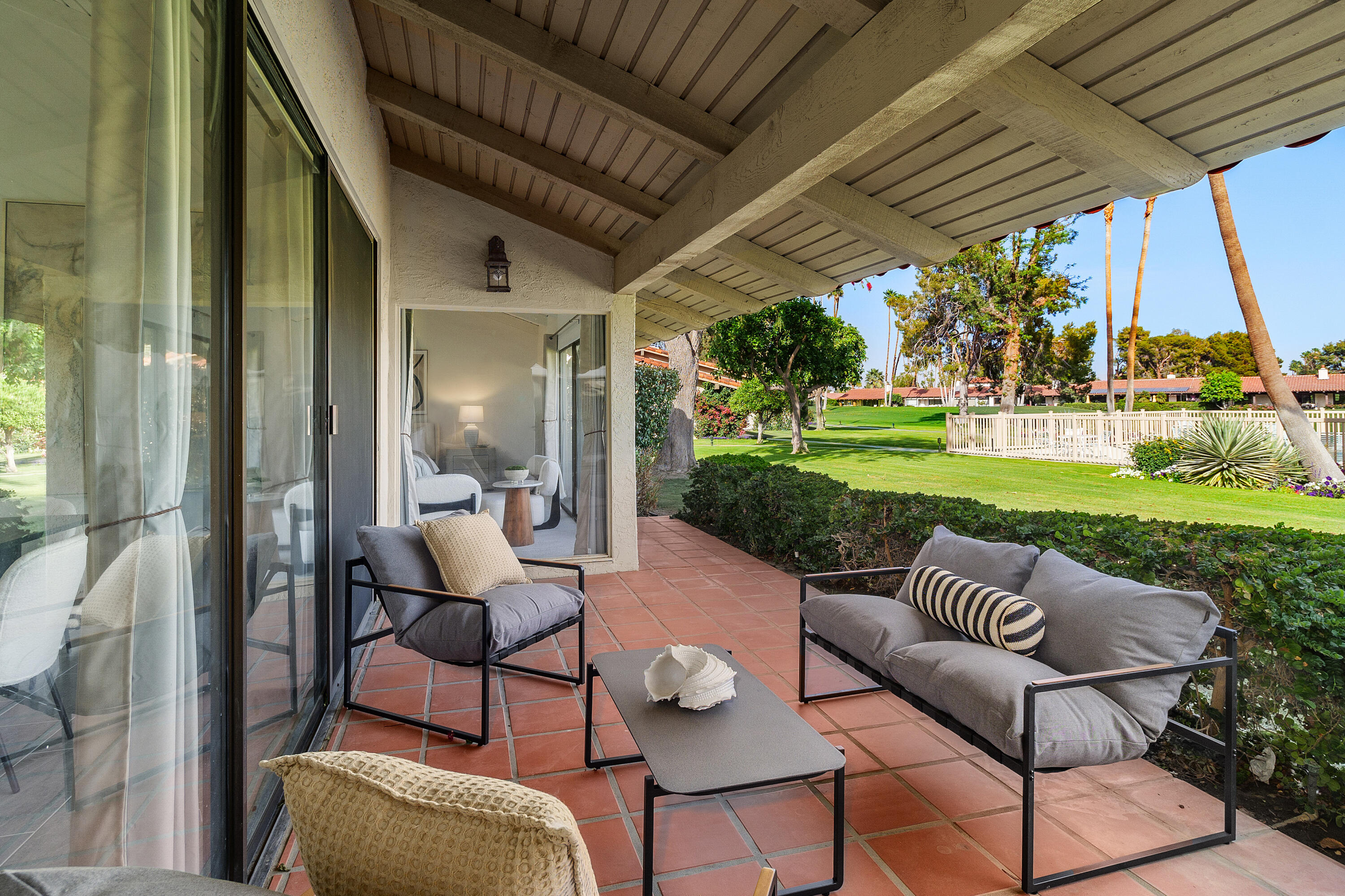 49835 Adelito Circle La Quinta, CA 92253 - Photo 31 of 36 a patio with yard table and chairs
