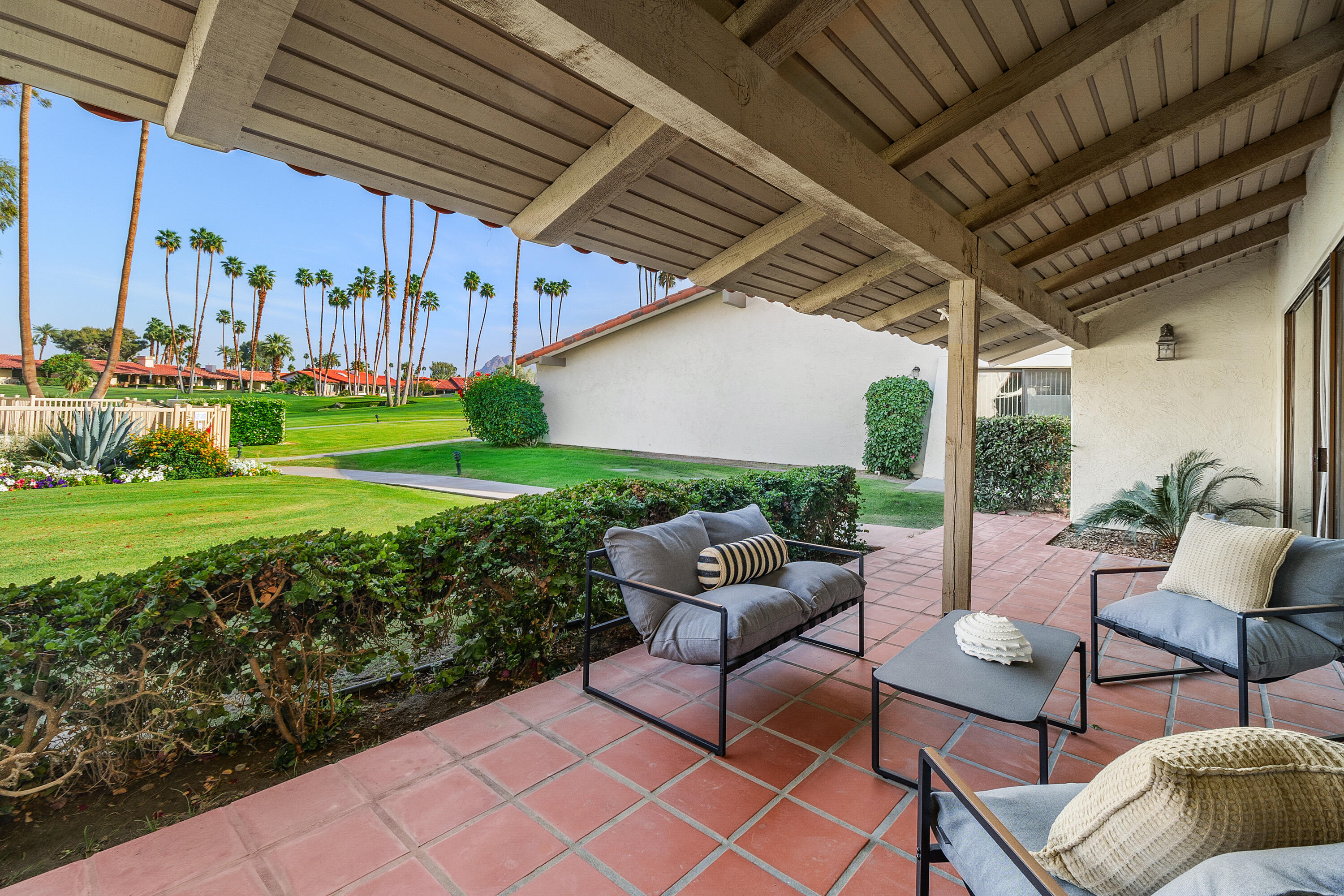 49835 Adelito Circle La Quinta, CA 92253 - Photo 32 of 36 a patio with yard and outdoor seating