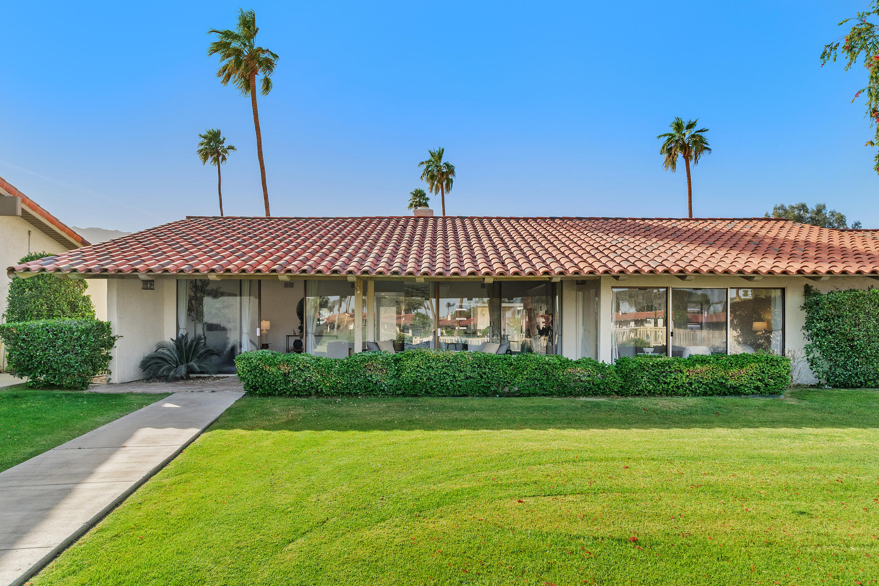 49835 Adelito Circle La Quinta, CA 92253 - Photo 36 of 36 a front view of a house with a garden