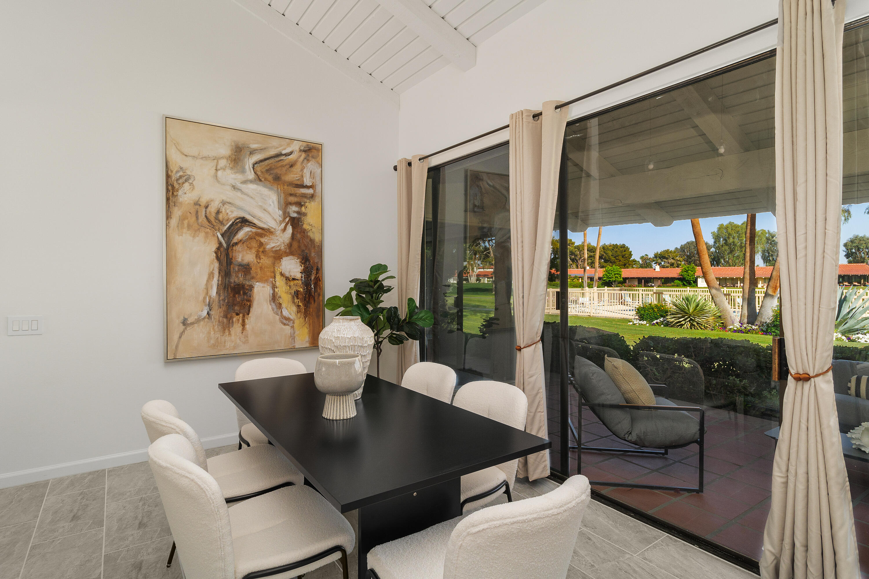 49835 Adelito Circle La Quinta, CA 92253 - Photo 5 of 36 a view of a dining room with furniture and chandelier