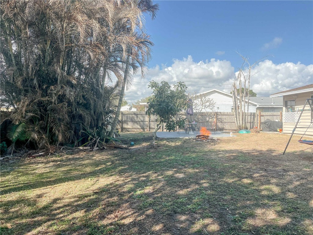 655 Chesser Avenue Sebastian, FL 32958 - Photo 15 of 17 a view of a house with a big yard