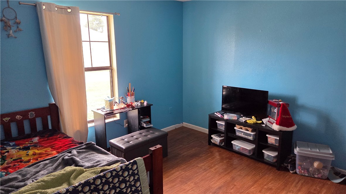 655 Chesser Avenue Sebastian, FL 32958 - Photo 10 of 17 a bedroom with furniture and a window