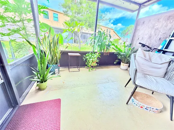 a potted plant sitting in front of a building