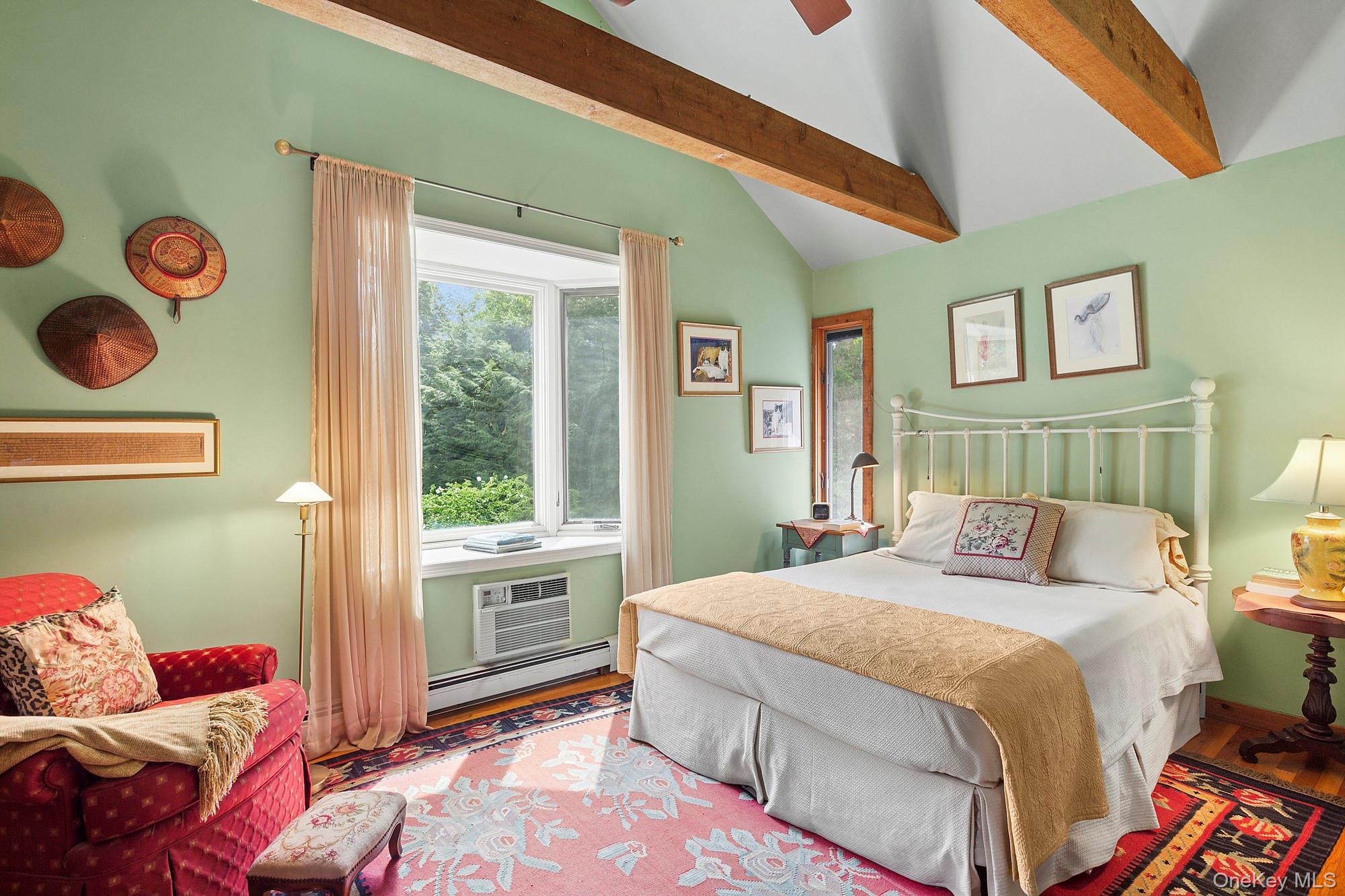 4528 Noyack Road Sag Harbor, NY 11963 - Photo 11 of 13 a bedroom with bed and a window