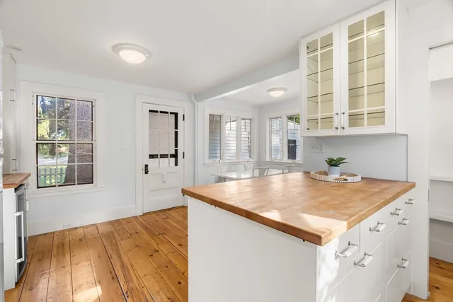 view of a kitchen counter top space and windows