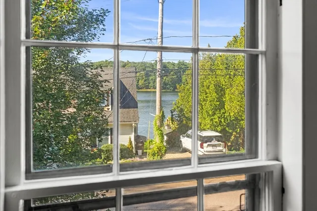 a view of a room that has a window