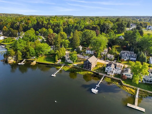 a view of a swimming pool with a table and chairs
