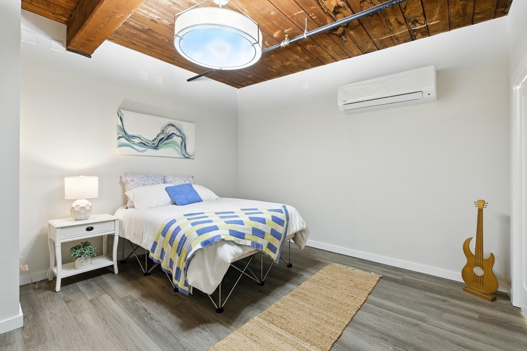 55 Sterling Street, Unit 314 Clinton, MA 01510 - Photo 18 of 36 a bedroom with a bed and a window