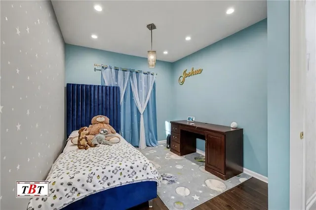 a view of a dining room with furniture and windows