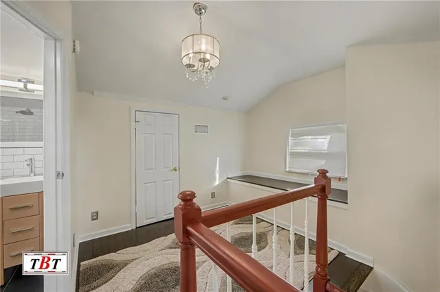 a large white room with a large mirror