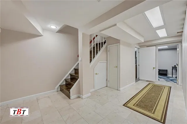 a bathroom with a toilet a sink and bathtub