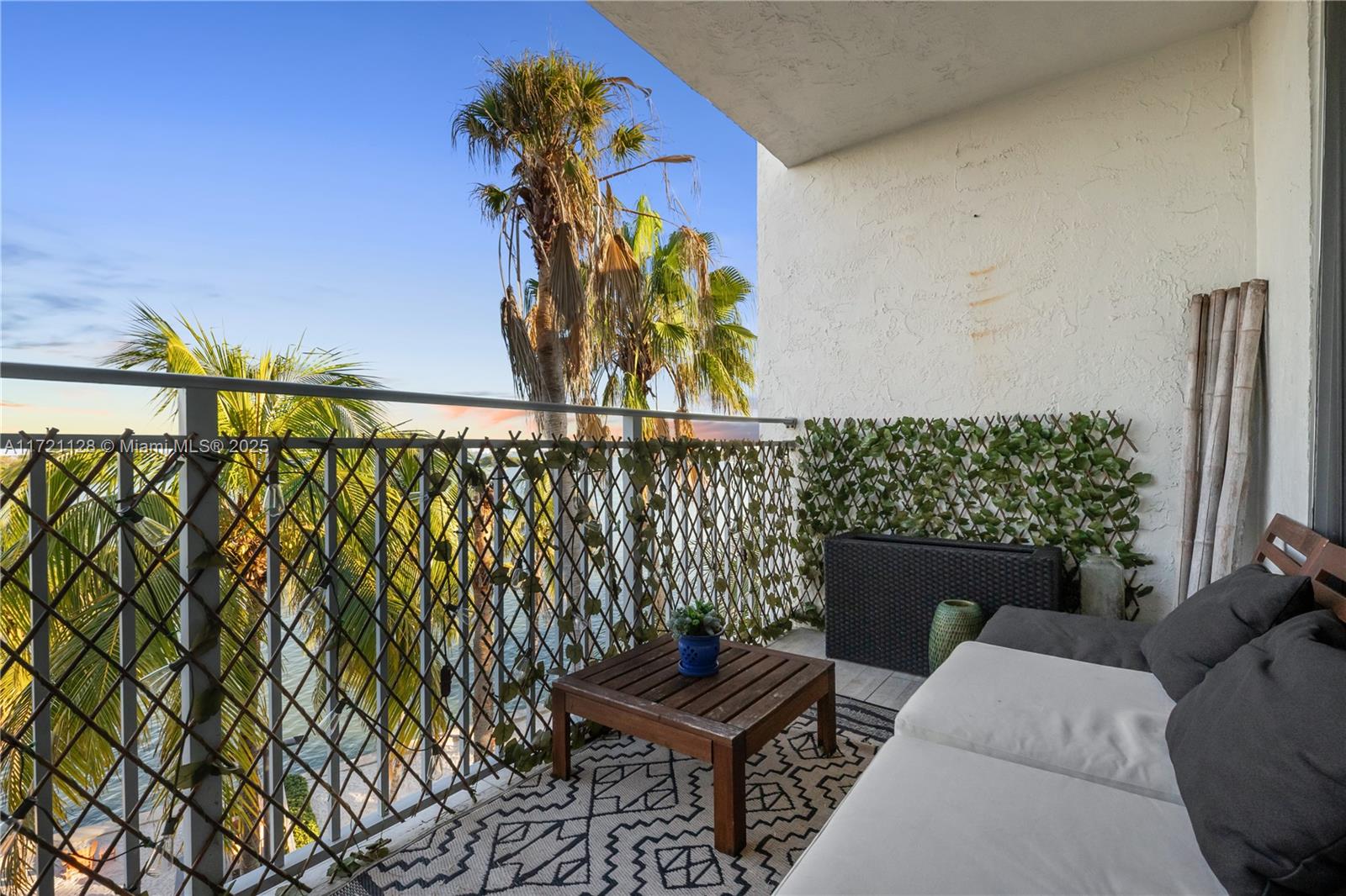 750 Northeast 64th Street, Unit B504 Miami, FL 33138 - Photo 21 of 37 a backyard of a house with outdoor seating