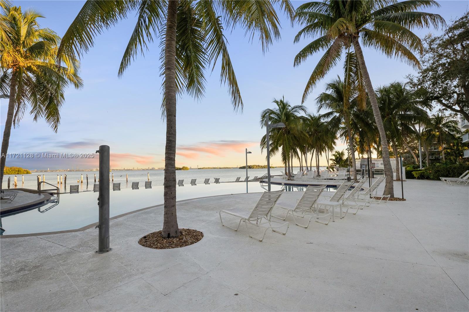 750 Northeast 64th Street, Unit B504 Miami, FL 33138 - Photo 24 of 37 a view of outdoor space with palm trees