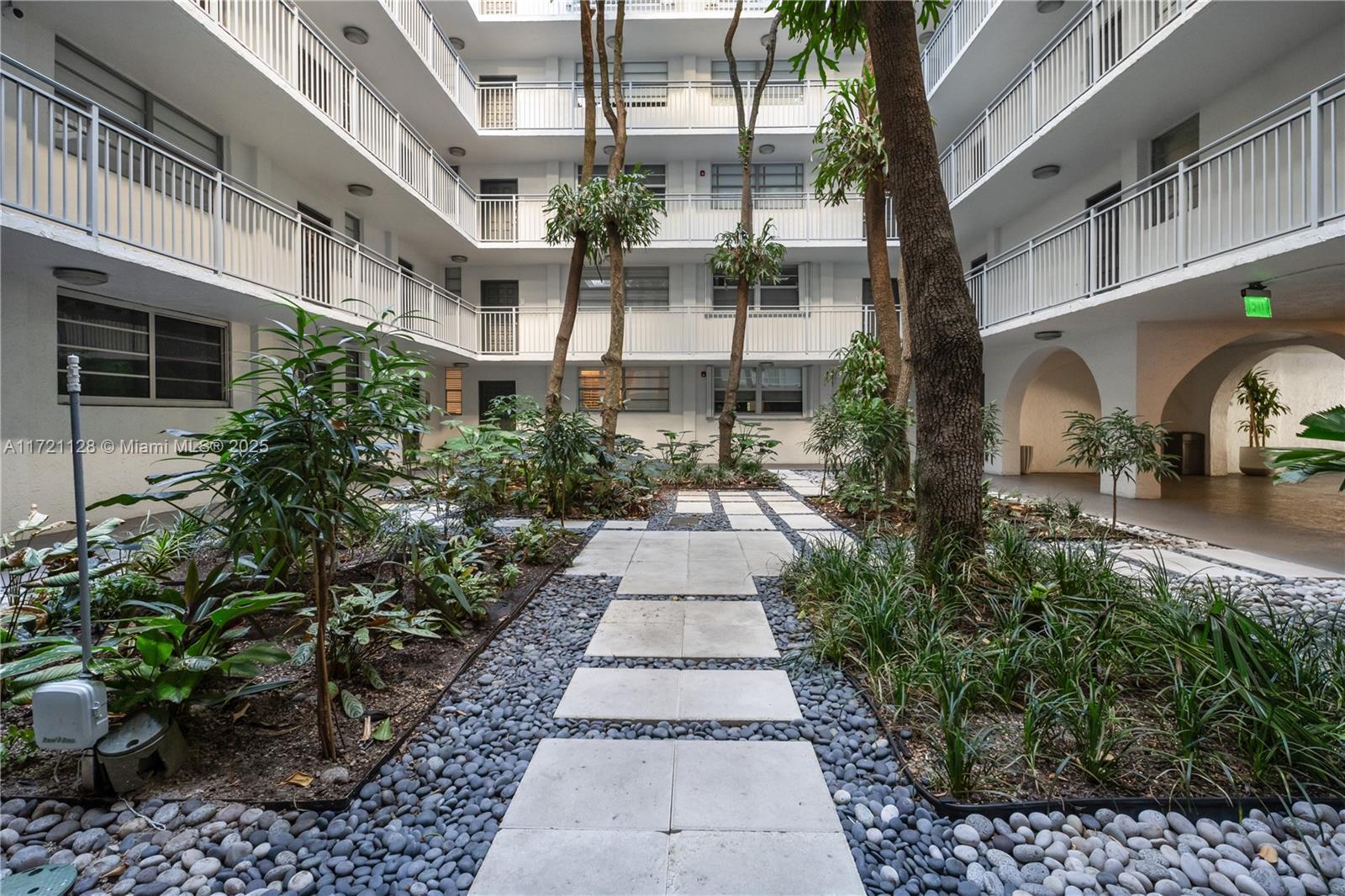 750 Northeast 64th Street, Unit B504 Miami, FL 33138 - Photo 30 of 37 a view of lobby with pathway