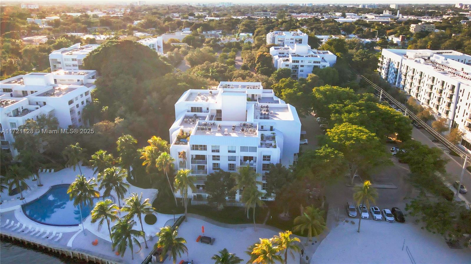 750 Northeast 64th Street, Unit B504 Miami, FL 33138 - Photo 35 of 37 an aerial view of a house with a lake view