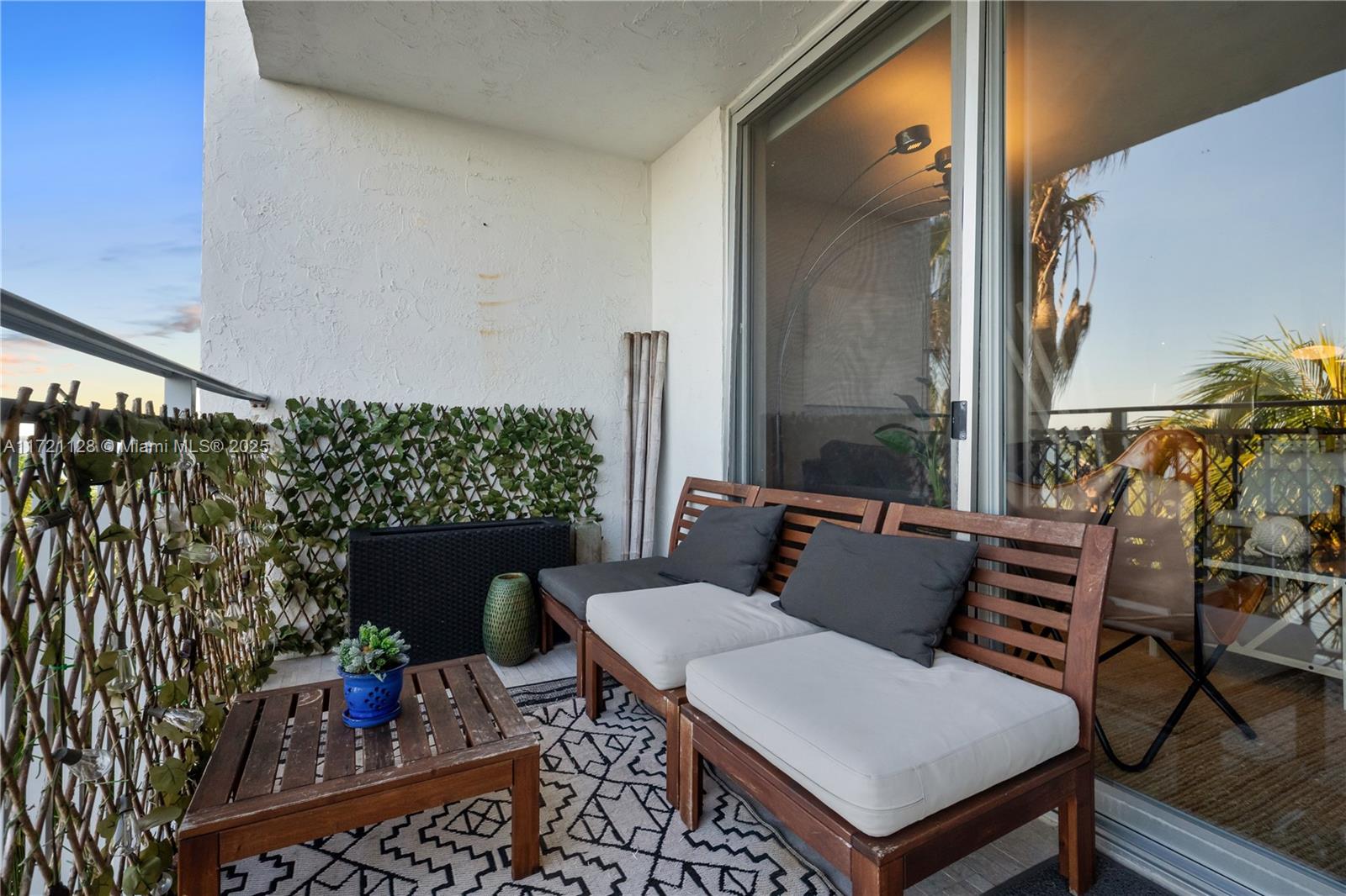 750 Northeast 64th Street, Unit B504 Miami, FL 33138 - Photo 5 of 37 a outdoor living space with furniture and outdoor view