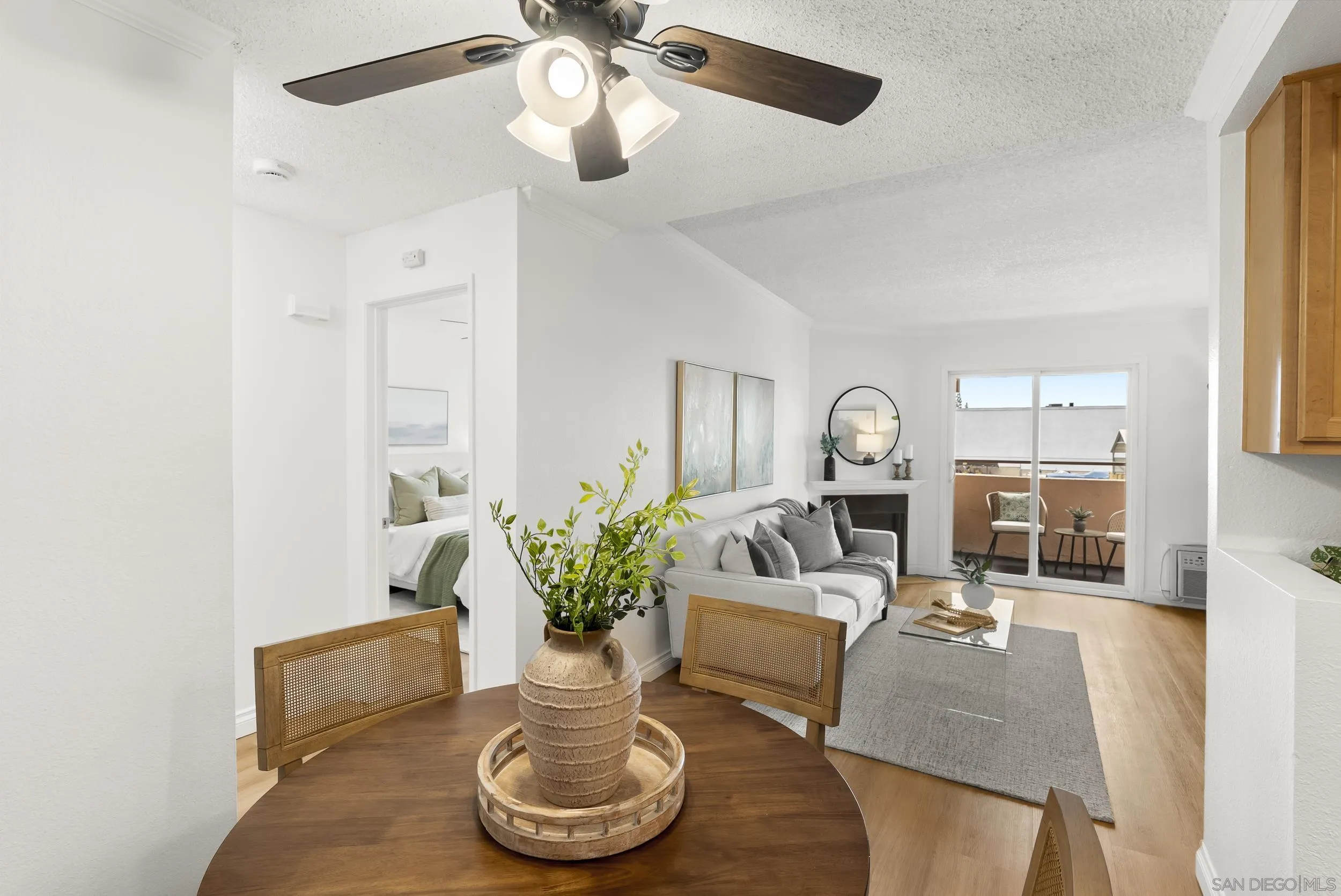 830 Broadway, Unit 15 El Cajon, CA 92021 - Photo 9 of 21 a living room with furniture and a potted plant