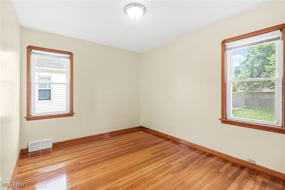 3205 George Avenue Cleveland, OH 44134 - Photo 20 of 32 Unfurnished room with light wood finished floors and baseboards