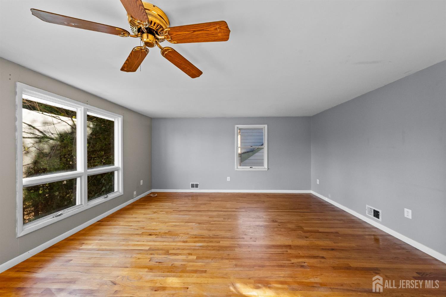 926 Hermann Road North Brunswick, NJ 08902 - Photo 19 of 54 a view of room with window and ceiling fan