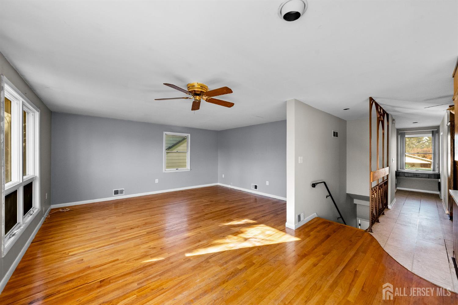926 Hermann Road North Brunswick, NJ 08902 - Photo 20 of 54 a view of a livingroom with a hall and wooden floor