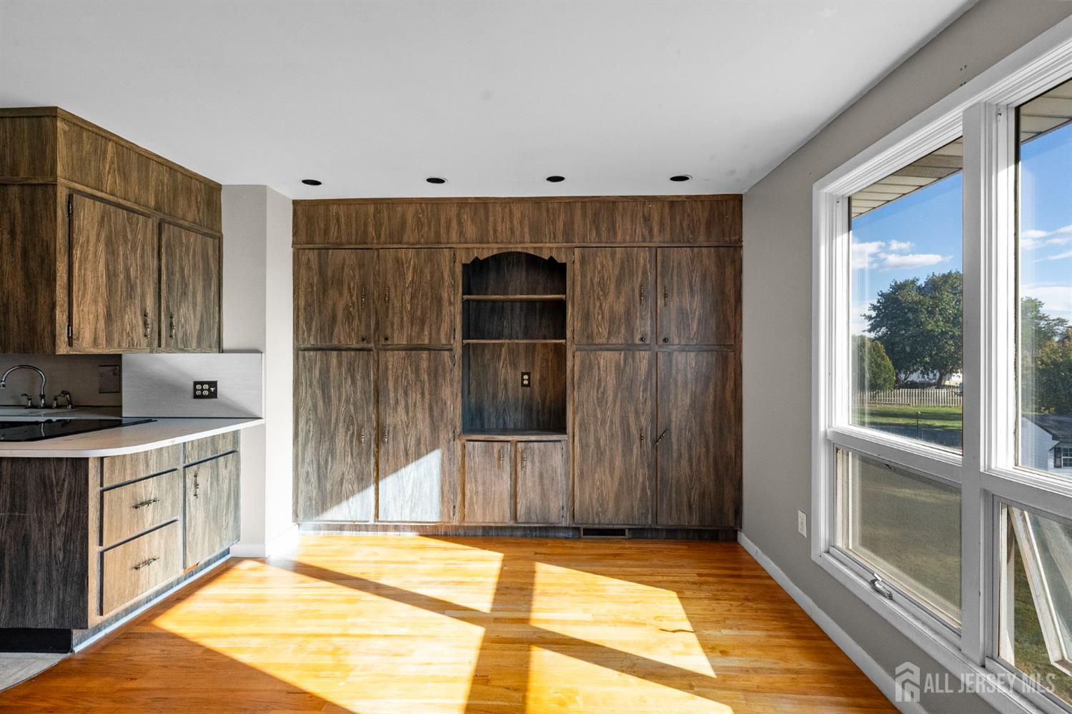 926 Hermann Road North Brunswick, NJ 08902 - Photo 23 of 54 a kitchen with a sink and a refrigerator