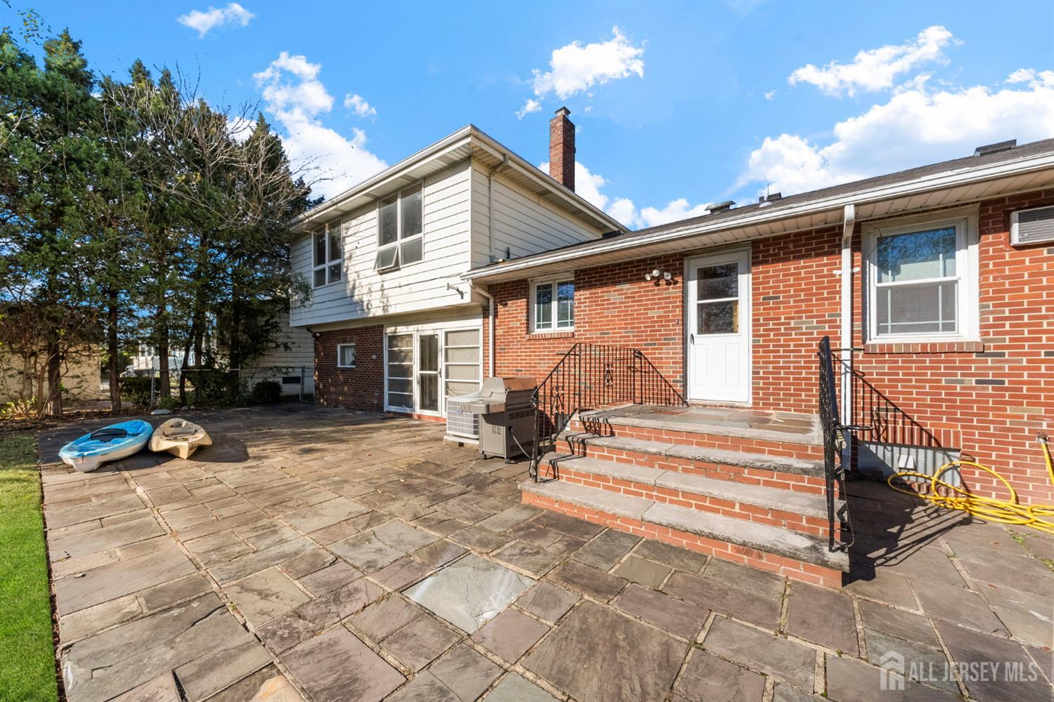 926 Hermann Road North Brunswick, NJ 08902 - Photo 44 of 54 a view of a house with a patio