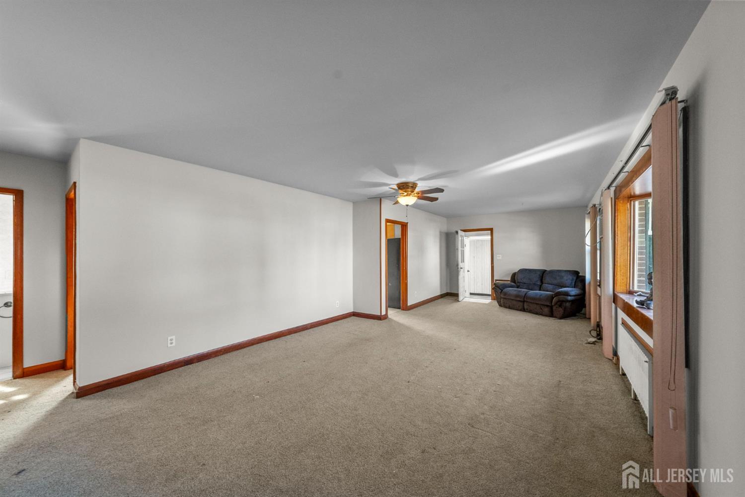 926 Hermann Road North Brunswick, NJ 08902 - Photo 5 of 54 a view of a livingroom with furniture and a window
